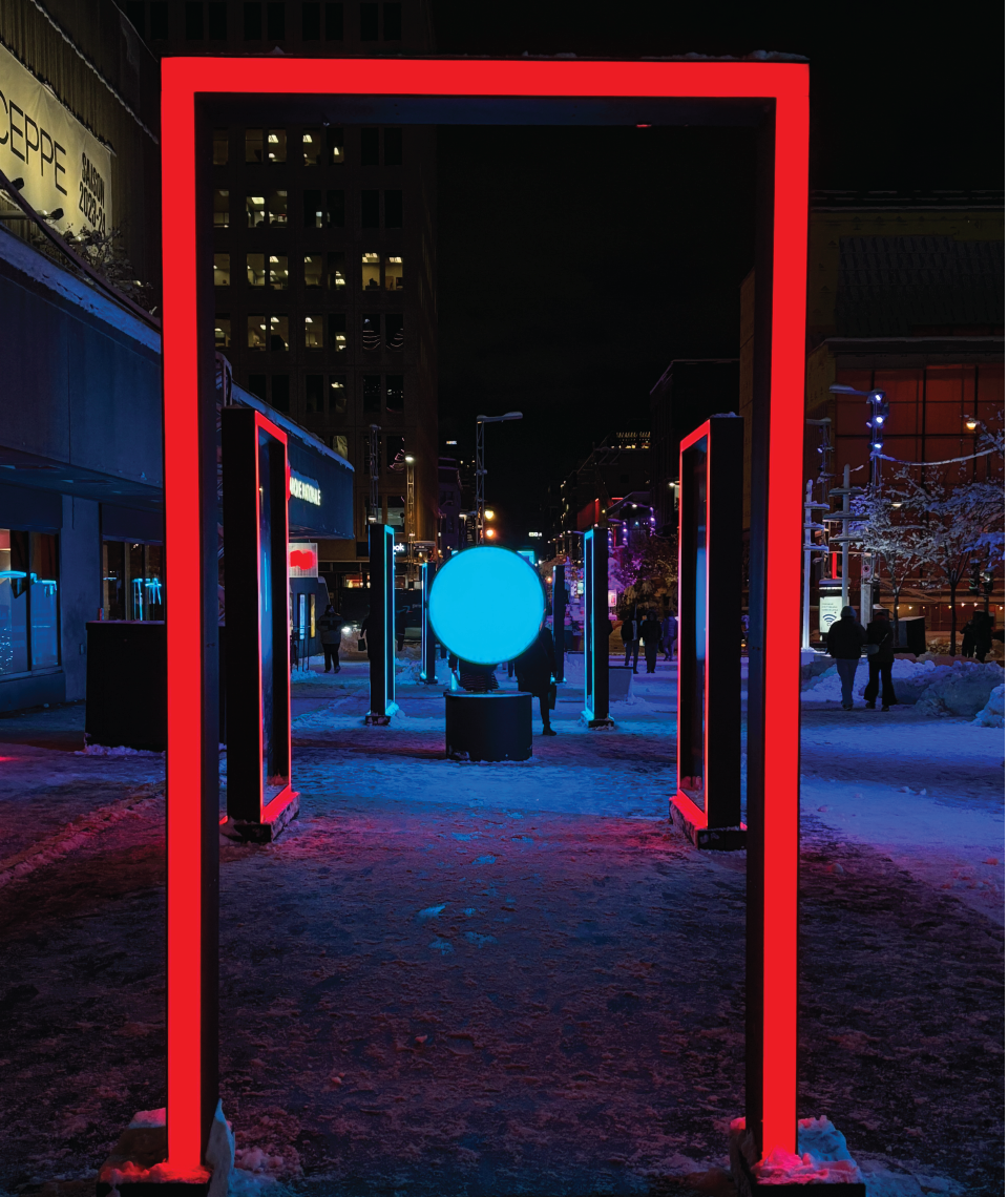 estructuras que se iluminan en la noche a las calles de montreal